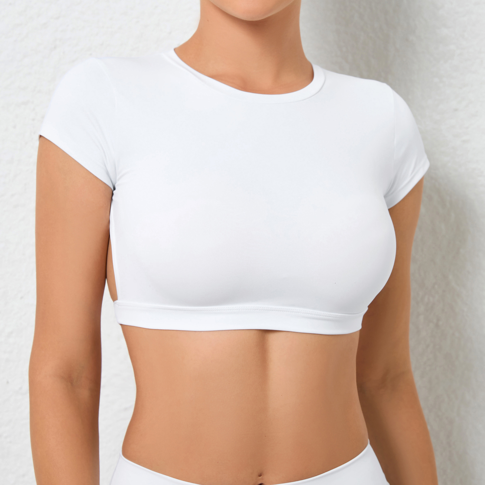 Picture of European and American new nude yoga big backless quick-drying tight sports top outdoor running with chest pad fitness T-shirt
