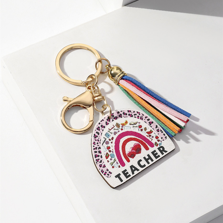 Picture of Europe and the United States hot keychain creative graduation season gift teacher rainbow wooden tassel pendant
