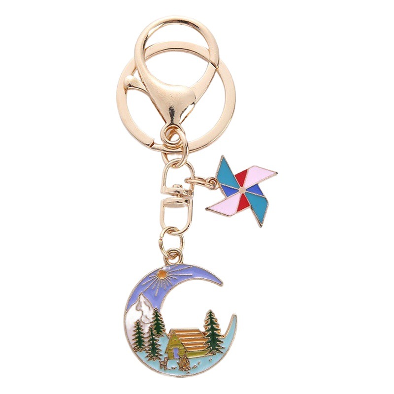 New Alloy Holiday Style Moon House Keychain Creative Sun Windmill Snow Mountain Forest Metal Bag Pendant