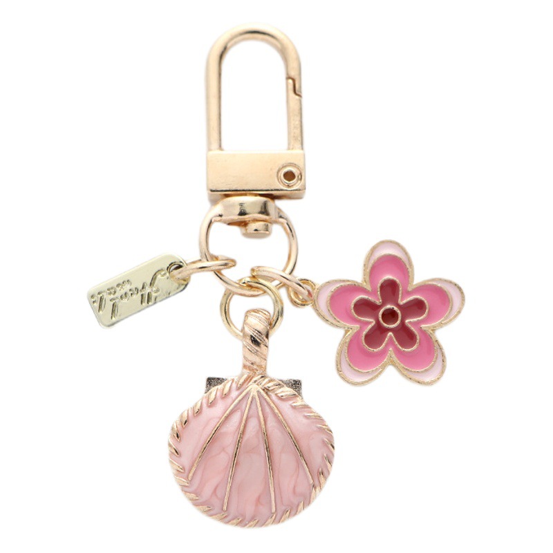New alloy shell car keychain small fresh cute color shell flower accessories decorative bag pendant