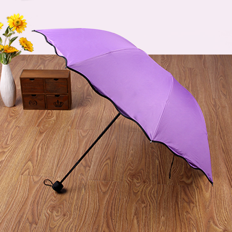 Picture of Factory wholesale creative three folding vinyl water flowering umbrella gift advertising umbrella umbrella can do LOGO