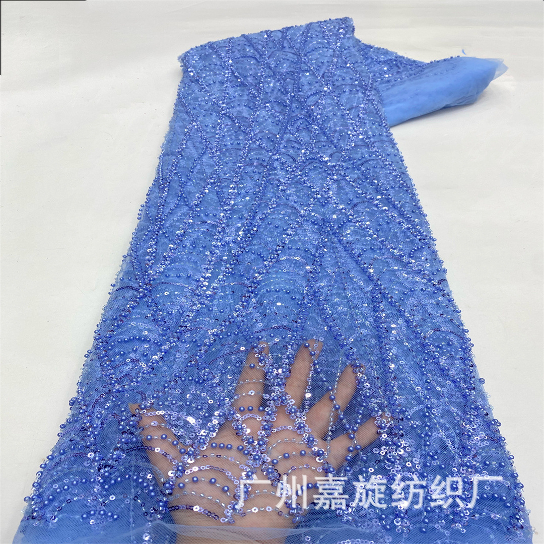 Heavy industry cross line bead tube embroidery sequin fabric wavy flower shape crystal wedding dress evening dress European and American clothing fabric