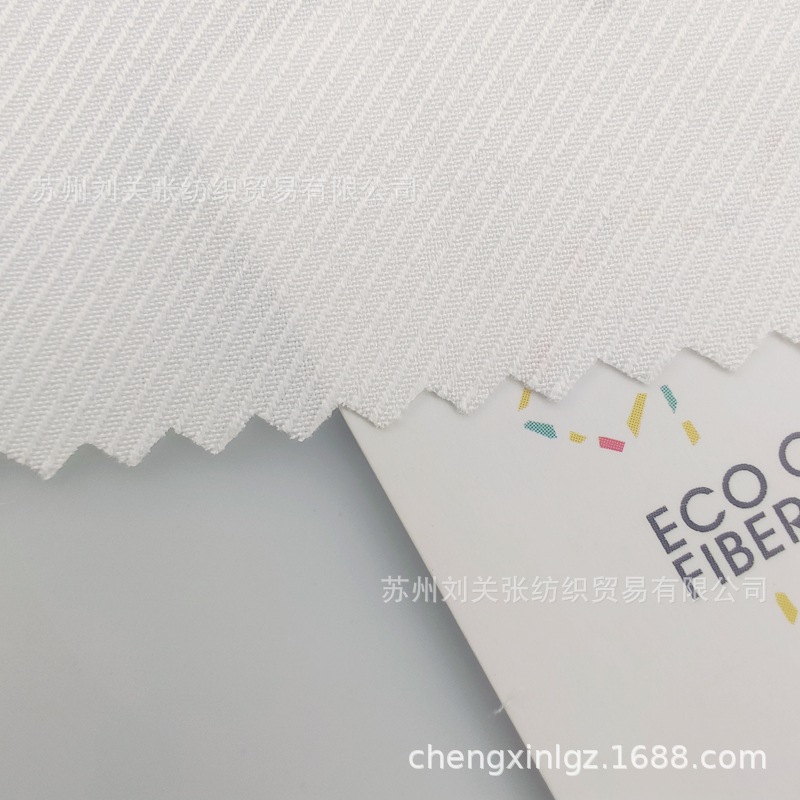 This white silk-like hot-selling all-polyester color cloud oblique fabric top dress fashion fabric wholesale supply