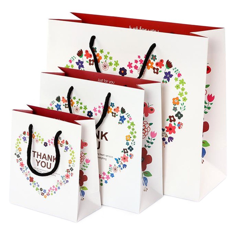 In stock floral gift bag wholesale new white clothing hand carrying packaging paper bag creative shopping handbag