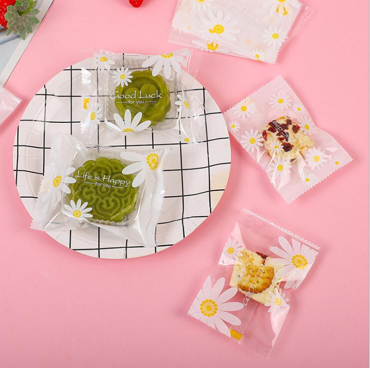Original transparent white bottom small Daisy snowflake crisp milk jujube packaging bag cookie mung bean cake bag moon cake machine sealing bag