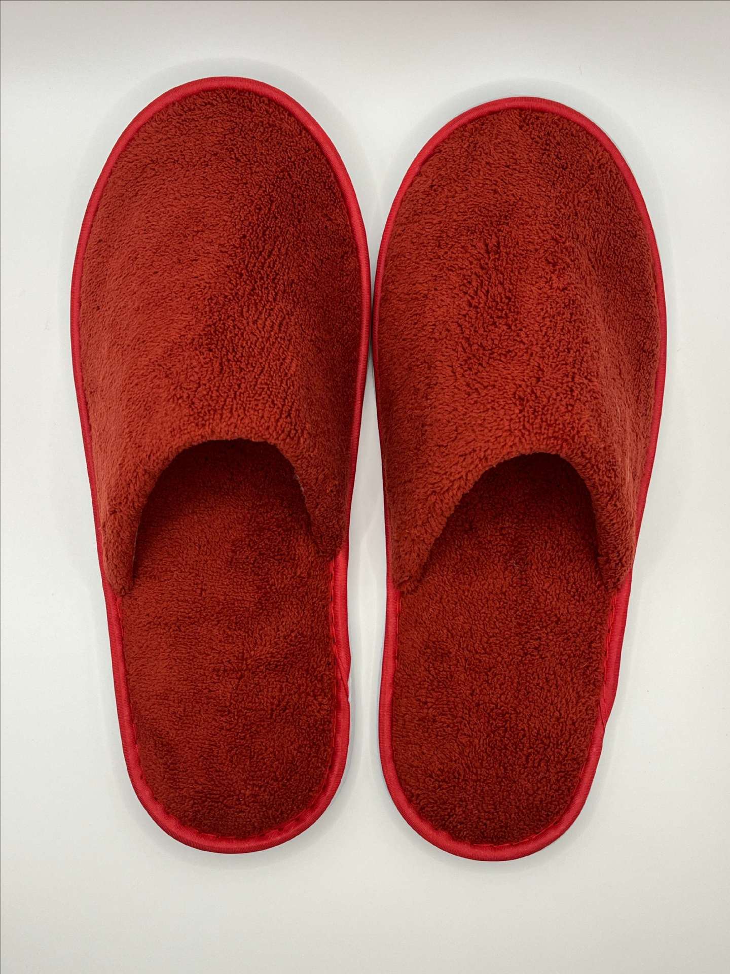 Picture of Disposable solid color coral fleece slippers hotel homestay couple slippers room hotel thickened slippers wholesale