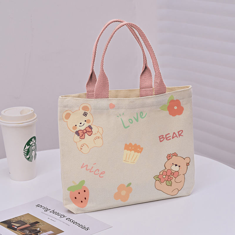 Picture of 2025 New Cute Cartoon Japanese Style Canvas Bag Tutorial Lunch Bag Manufacturer Wholesale Bag Women's Bag Handbag