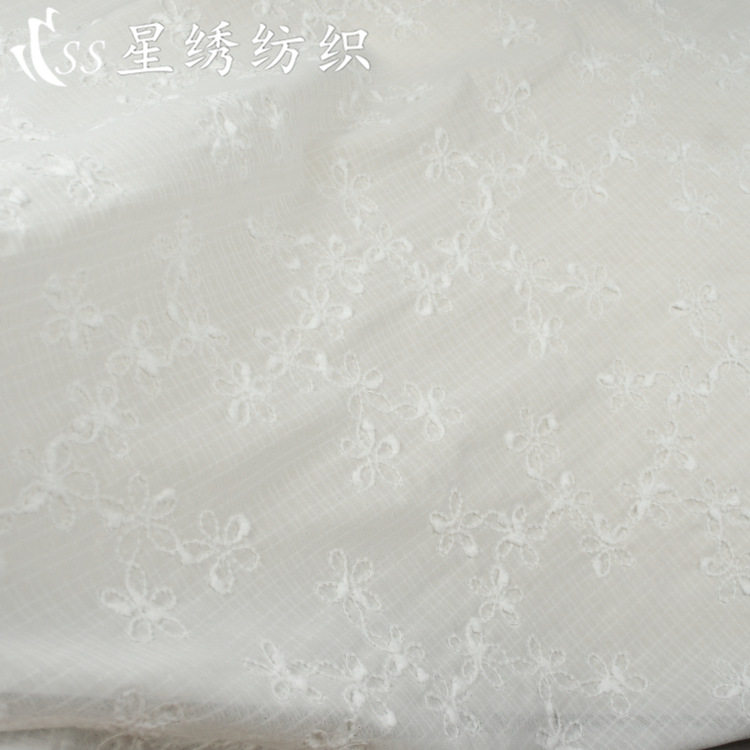 Picture of Hot-Selling Plaid Chiffon Embroidered Fabric with Small Pom-Poms, Five-Petal Flower Embroidery, Skin-Friendly Chiffon Long Dress, Sun Protection Clothing Fabric