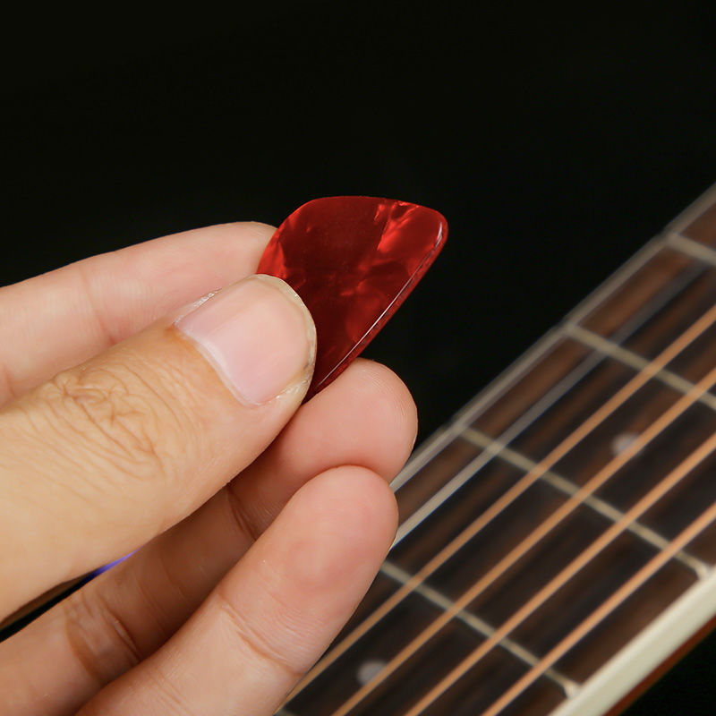 Picture of Guitar pick wooden guitar electric guitar ukulele pick Universal celluloid pick wear-resistant elastic-resistant thin