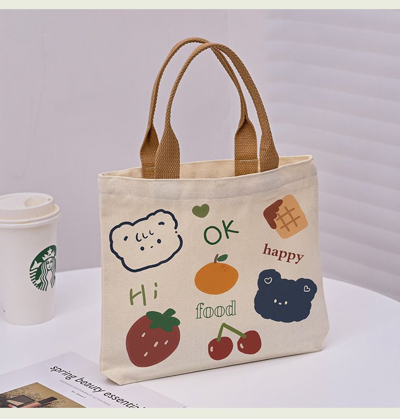 Picture of 2025 New Cute Cartoon Japanese Style Canvas Bag Tutorial Lunch Bag Manufacturer Wholesale Bag Women's Bag Handbag