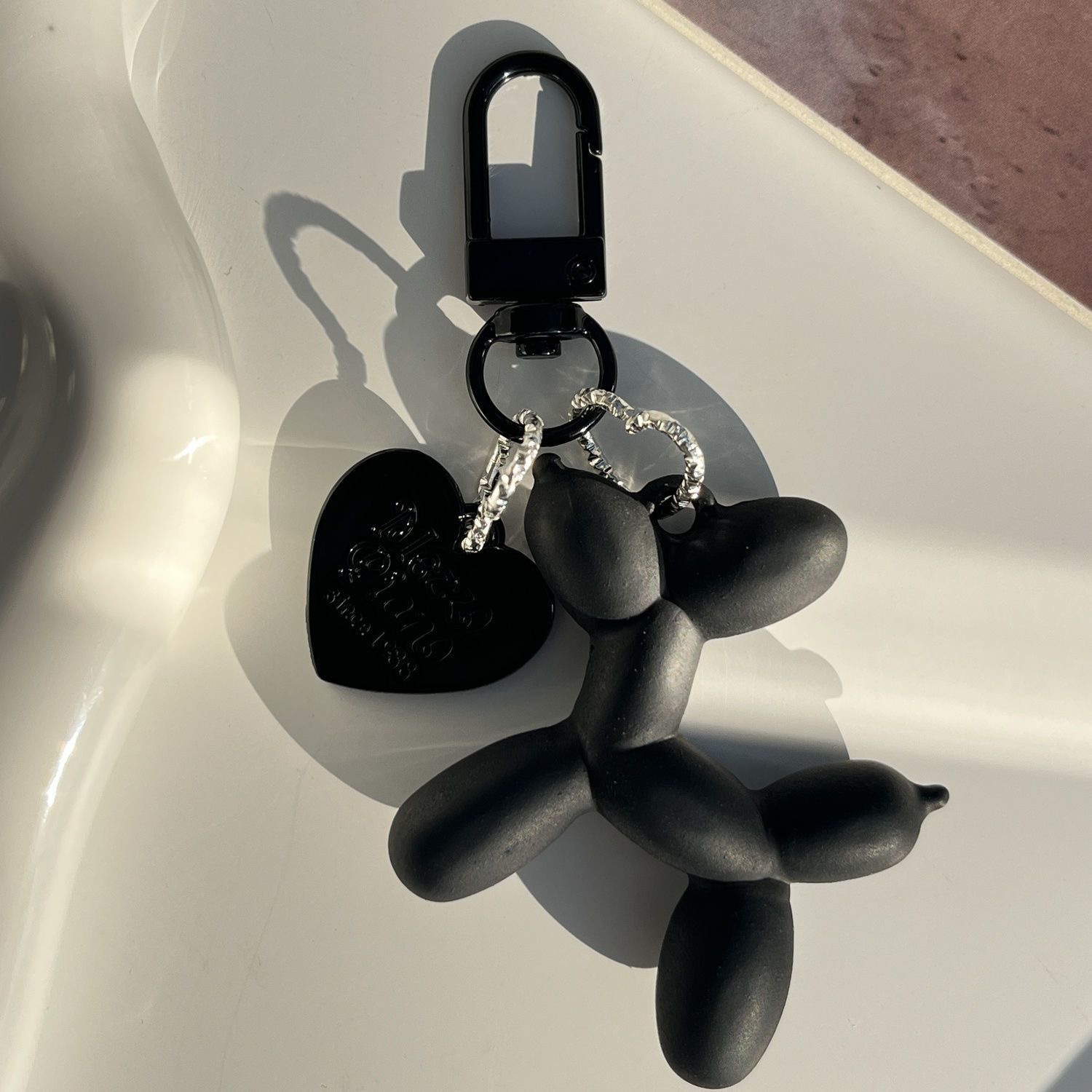 Picture of Dopamine Rose Red with Black Keychain Pendant Female Internet Celebrity High-End Niche Handmade Balloon Dog Bag Pendant Versatile
