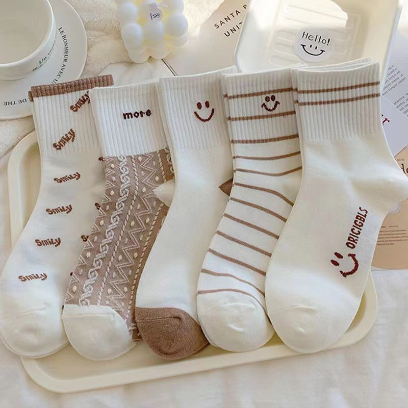 Women's socks autumn and winter mid-calf length socks Japanese warm deodorant sweat-absorbent student trendy simple smiley face women's socks