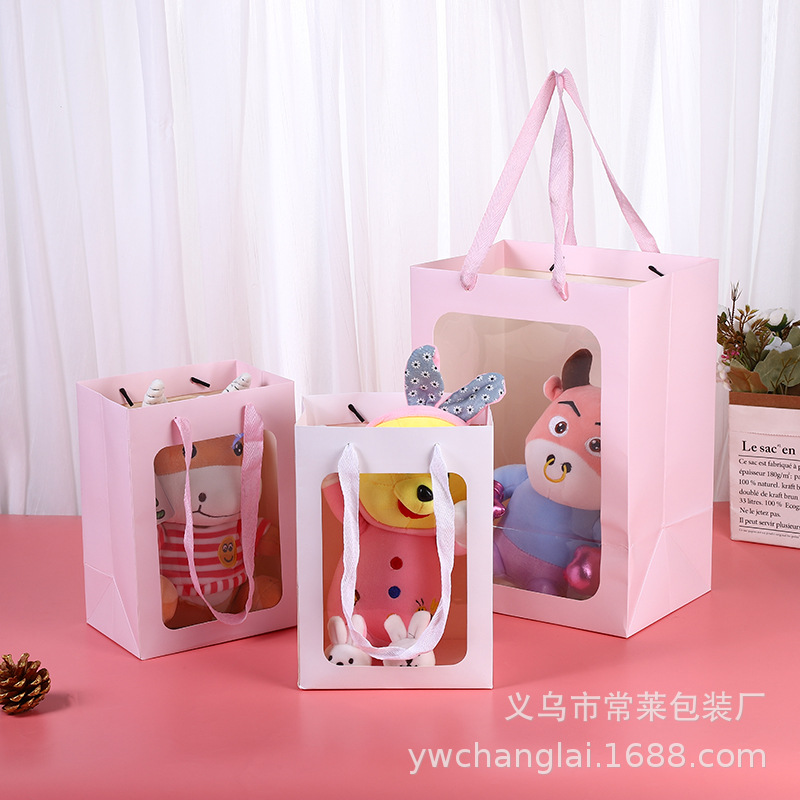 Creative high-end sense handbag transparent window gift bag gift holiday packaging bouquet doll paper bag flower bag
