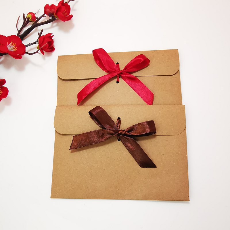 Picture of European envelope Kraft paper style vintage greeting card blessing card packaging bag creative bow CD bag wholesale