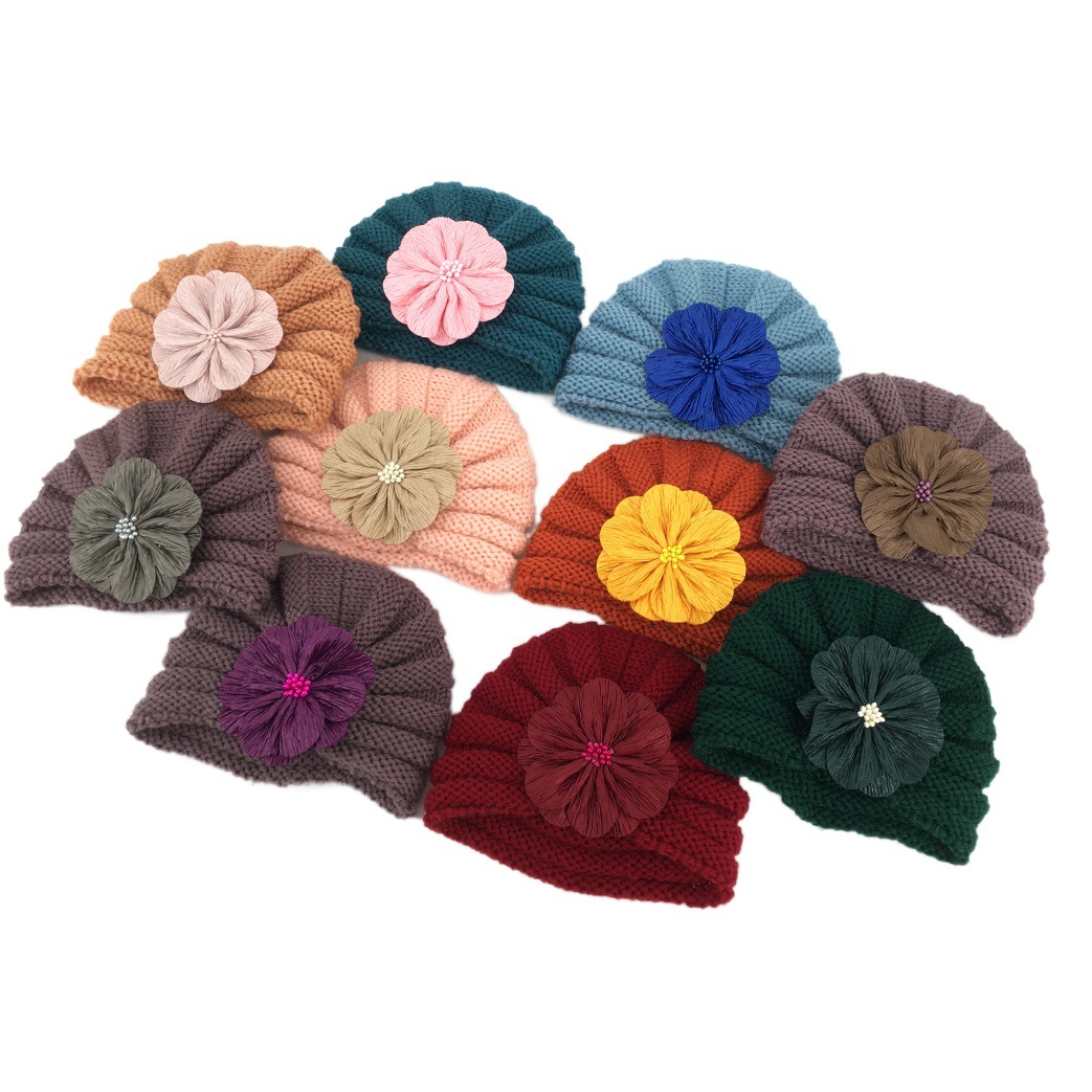 baby supplies European and American children's warm knitted hat baby flower autumn and winter wool hat baby hat