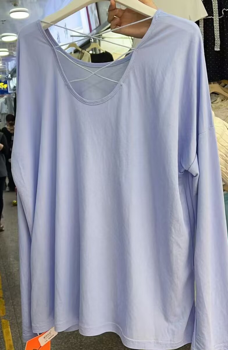 Picture of Loose Version of Thin Backless Long-Sleeved Sun Protection T-Shirt Women's Air-Conditioned Blouse Niche Design Top Summer Light