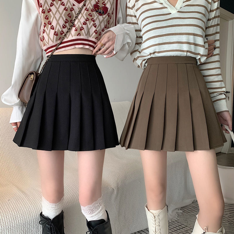 Pleated skirt 2023 new Korean version of high waist A- line skirt women's spring and summer jk White autumn and winter solid color skirt wholesale