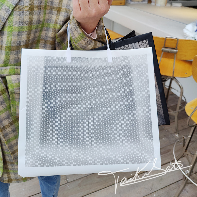 Korean version of PVC portable high-value mesh fork ear plastic bag with hand gift transparent bag packaging handbag wholesale