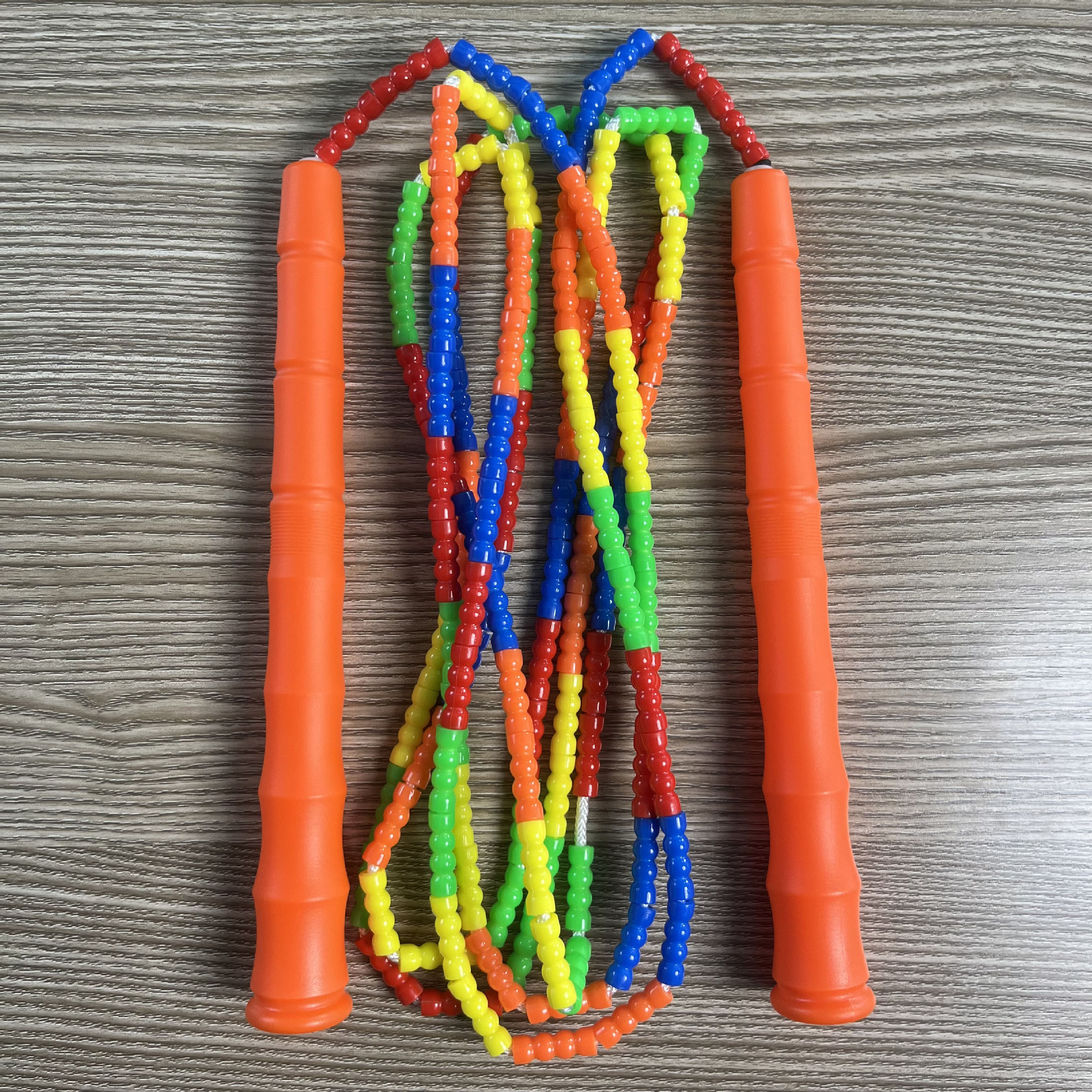 Picture of Manufacturer Wholesale Children's Fitness Sports Pattern Skipping Rope Kindergarten Competition Soft Bead Bamboo Skipping Rope for Primary School Students