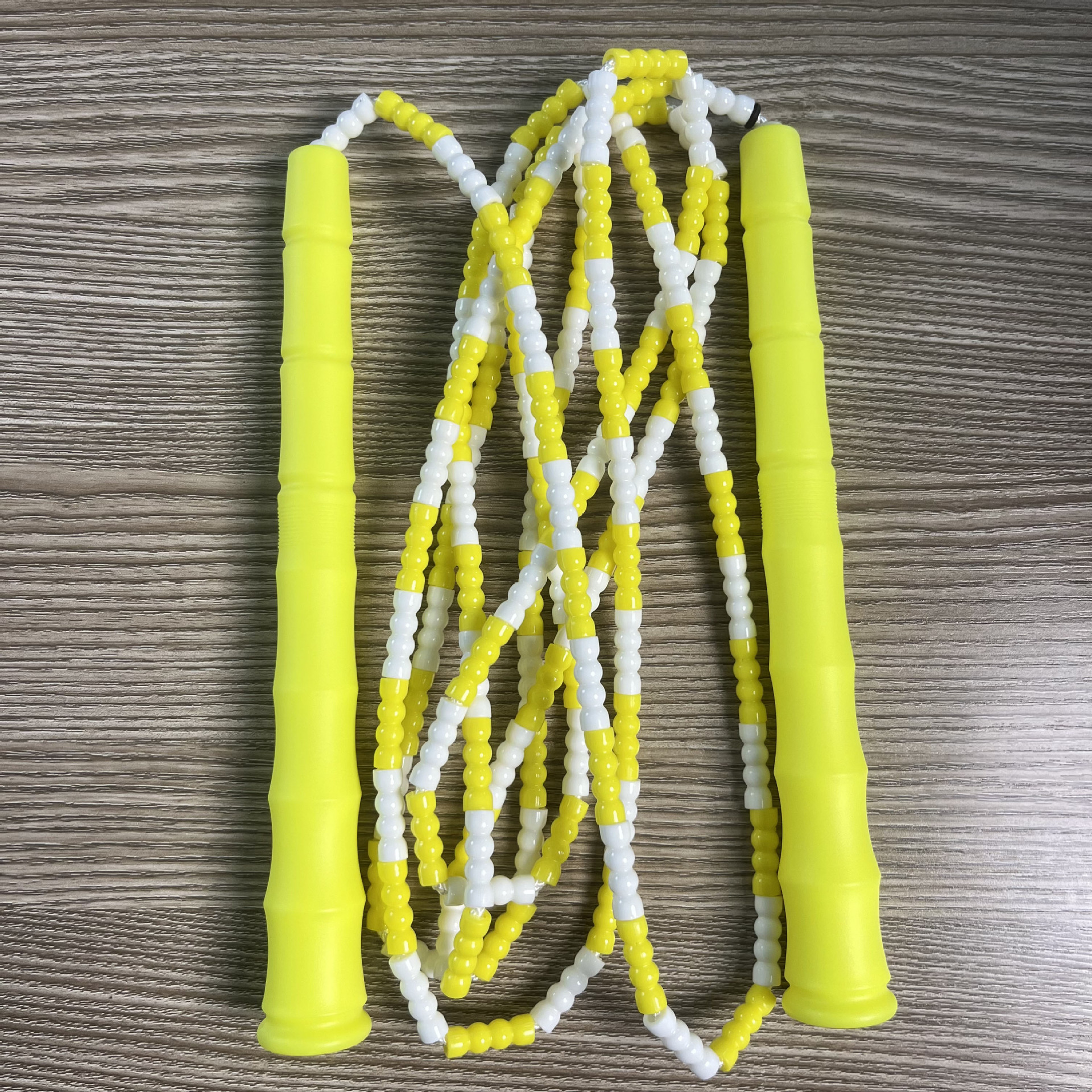 Picture of Manufacturer Wholesale Children's Fitness Sports Pattern Skipping Rope Kindergarten Competition Soft Bead Bamboo Skipping Rope for Primary School Students
