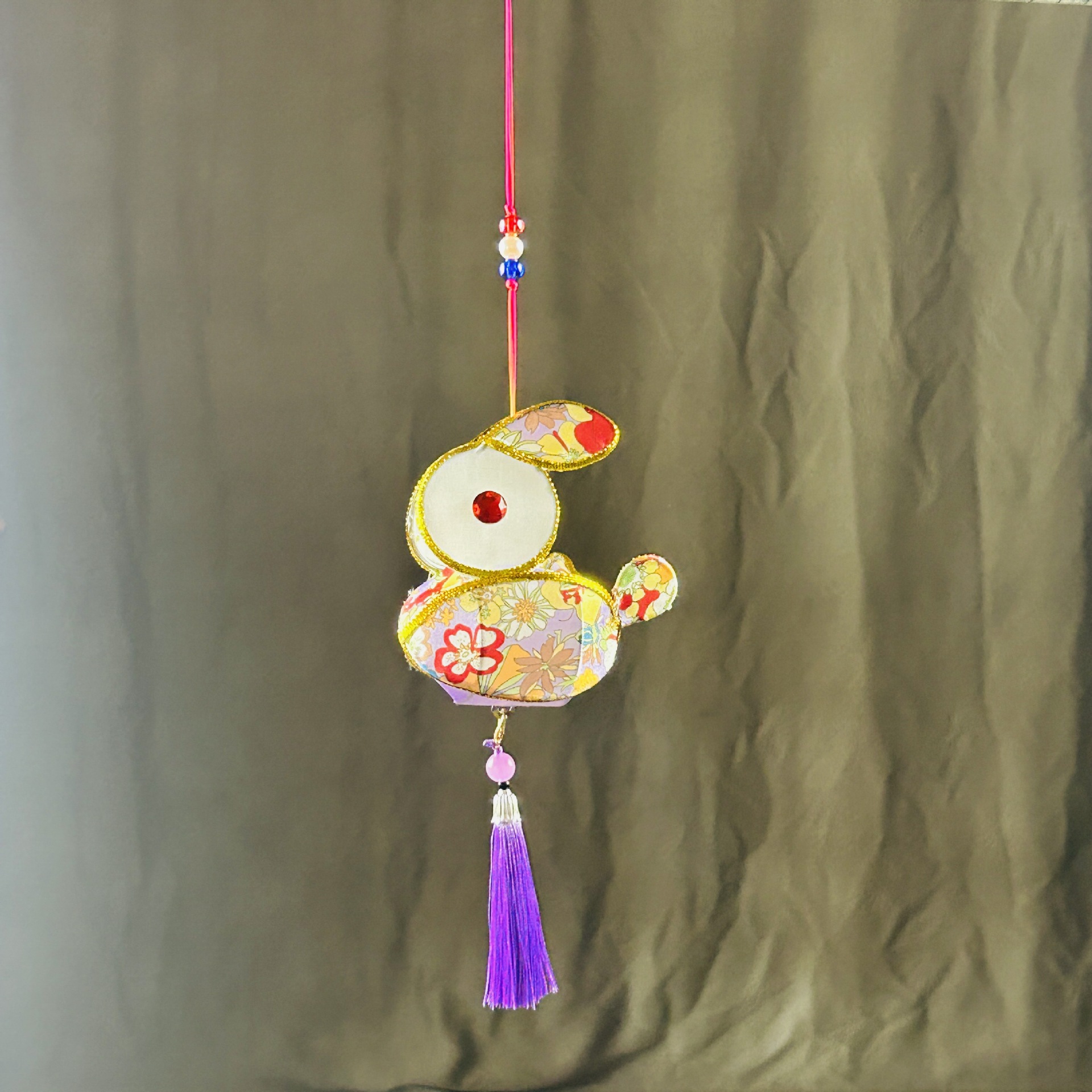 Picture of Traditional Handmade Lanterns for Spring Festival Lantern Festival Portable Iron Silk Cloth Luminous Mini Rabbit Lantern