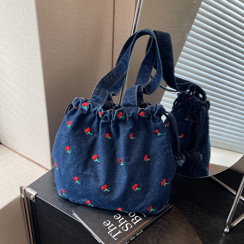 Picture of Foreign Order 2025 New Denim Bucket Bag Large Capacity Women's Bag Niche Design Shoulder Bag High-End Armpit Bag Trendy