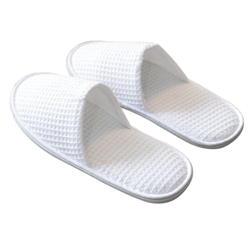 Picture of Hotel and homestay disposable waffle slippers home hospitality travel thickened slippers can be wholesale ordered LOGO