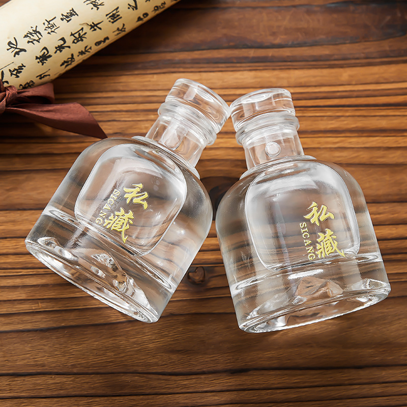 Picture of Transparent white wine bottle in stock two two small wine bottle glass round spherical white wine bottle with packaging sub-packaged empty bottle