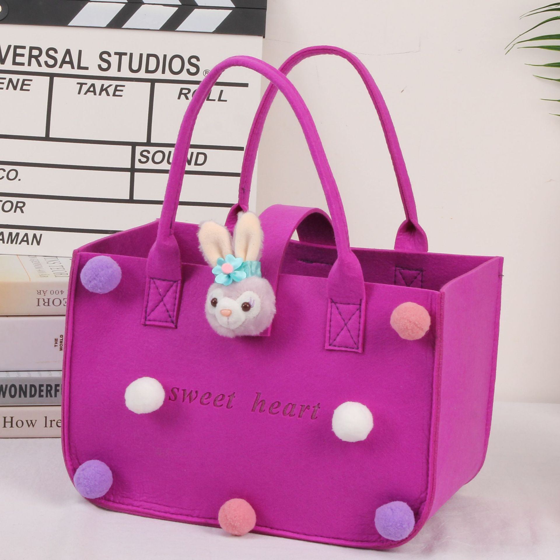Picture of 2022 felt cartoon handbag hand bag gift bag Net Red full moon wine birthday gift bag wholesale