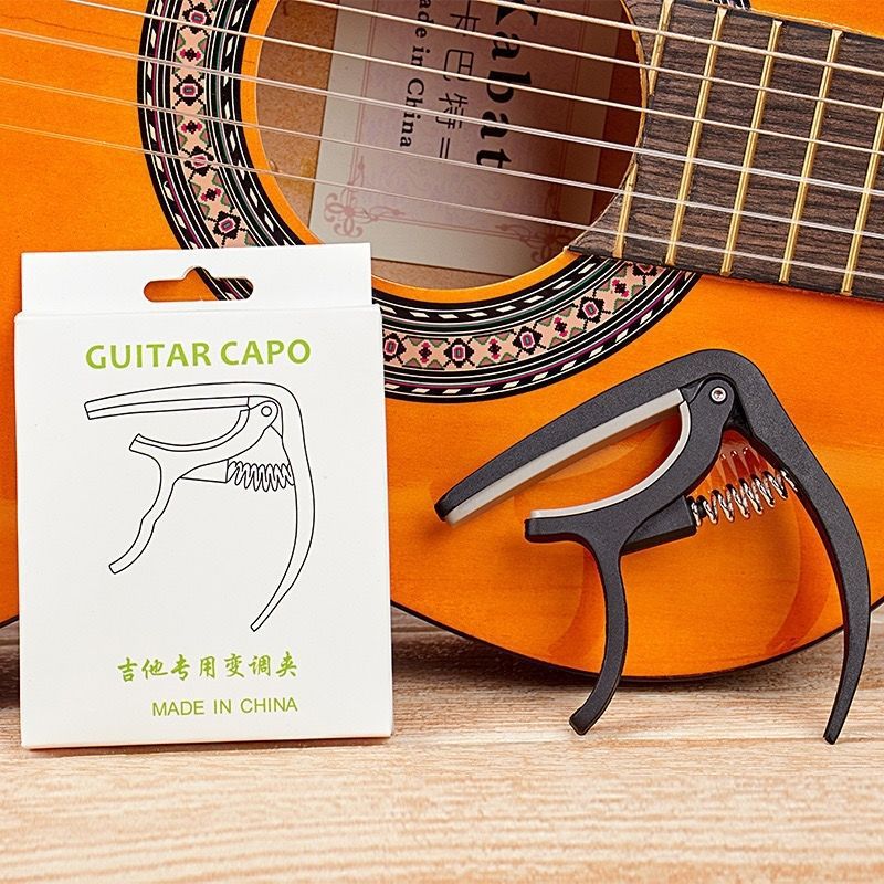 Picture of Guitar Capo, Individually Packaged Plastic Capo, Electric Guitar, One-Clip Dual-Purpose Classical Piano Clip, Guitar Accessories