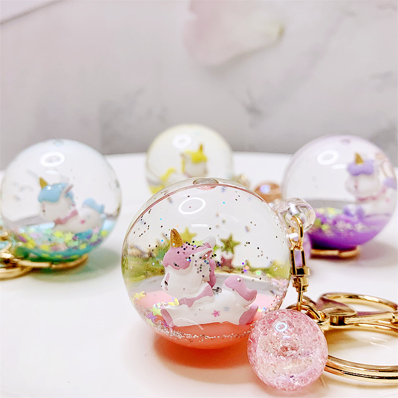 Creative liquid oil key chain quicksand key chain crystal ball unicorn floating car cute bag small pendant