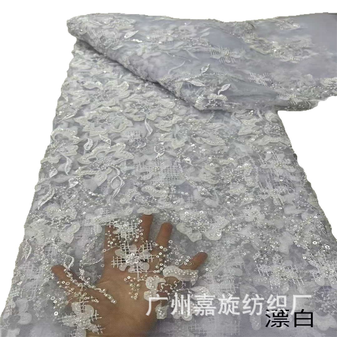 Picture of 2025 New Laser Floral Mesh Yarn Bead Tube Embroidery 3D Applique Pearl Sequin Embroidery Fashion Lace Fabric Beaded