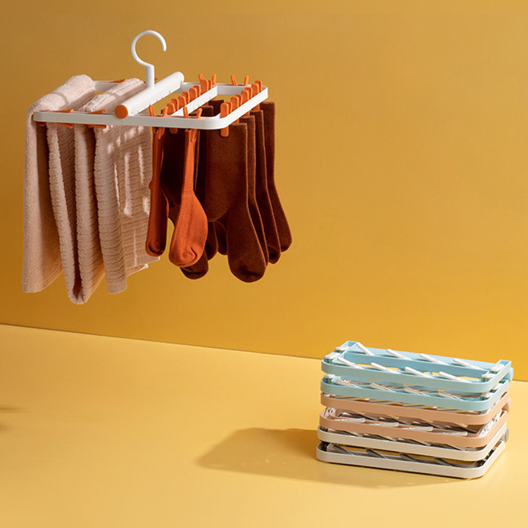Picture of Household Clothes Rack Folding Clothes Drying Rack Storage Artifact Windproof Disc Clothes Rack Multi-clip Baby Socks Rack