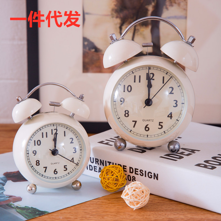 Picture of European-style retro pointer desk clock metal creative bell alarm clock desktop mute student night light quartz desk clock