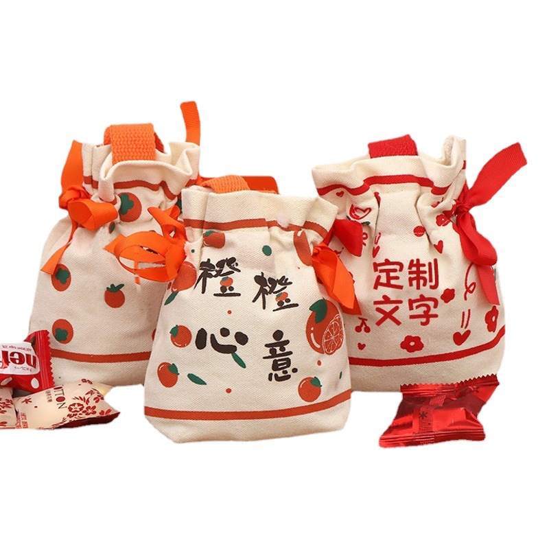 Factory wholesale hand gift in stock portable canvas bag small Lucky Bag candy bag custom printed logo drawstring bag