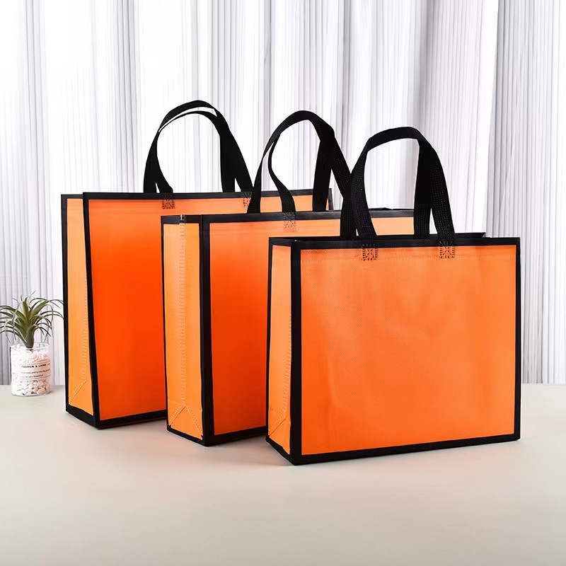 In stock clothing store non-woven bag portable supermarket shopping bag wholesale promotional gifts film Non-woven bag