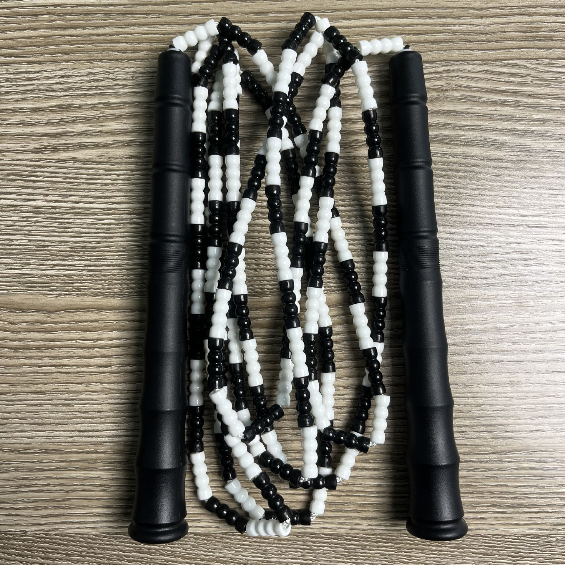 Picture of Manufacturer Wholesale Children's Fitness Sports Pattern Skipping Rope Kindergarten Competition Soft Bead Bamboo Skipping Rope for Primary School Students