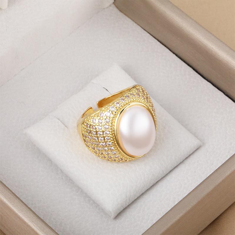 Fashion new copper plated 18k gold inlaid white pearl retro hollow diamond opening finger ring ring wholesale
