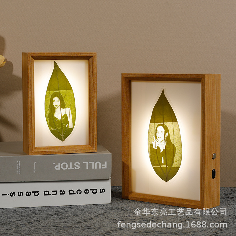 Picture of Leaf carving touch switch creative luminous photo frame table manufacturers wholesale clip picture frame paper-cut night light table