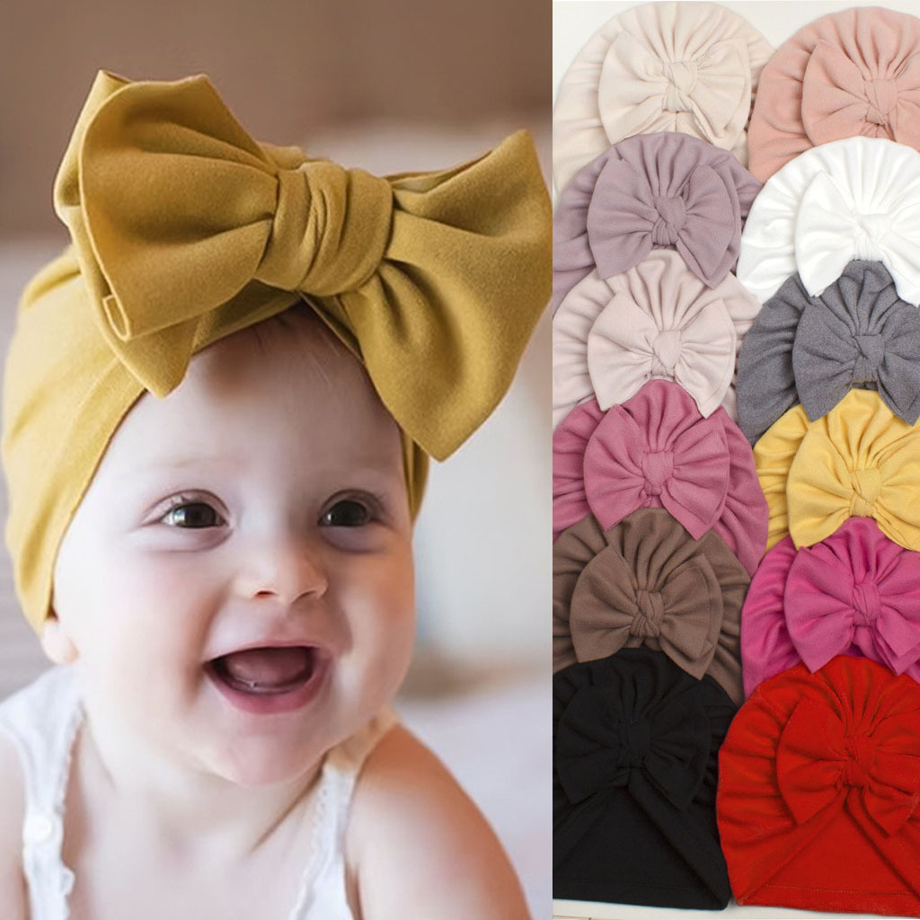 European and American winter warm plain children's pullover hat baby soft and comfortable bow headscarf hat baby hat