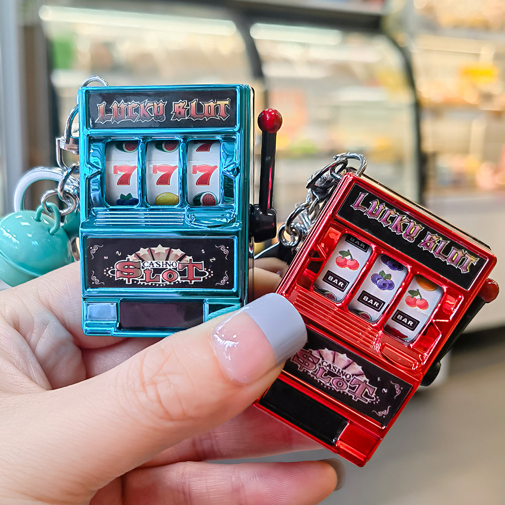 Creative mini fruit machine can hang the key chain fun lottery machine toy gift bags pendant wholesale