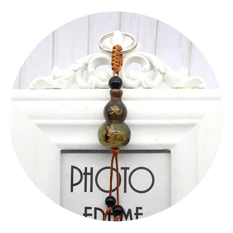 Zodiac horn gourd key chain stall exhibition bronzing lettering imitation horn key pendant wholesale