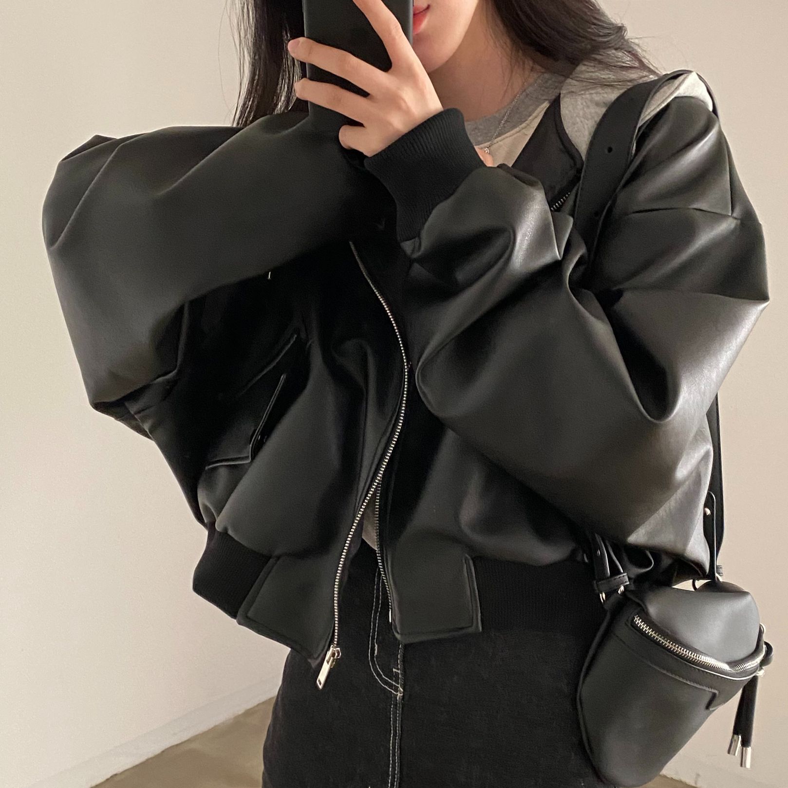 Picture of Korean Chic Autumn and Winter Niche Retro Zipper Double Pocket Casual Loose Versatile Faux Two-Piece Hooded Leather Jacket