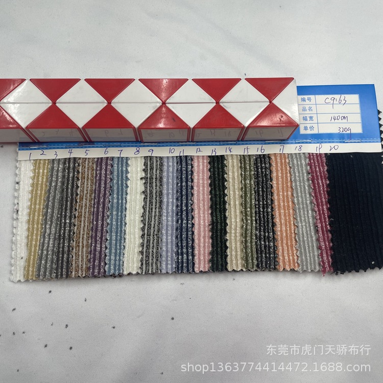 In stock supply knitted TR yarn-dyed irregular rib pit fabric 320g TR snowflake Huashun pit fabric