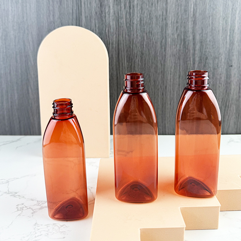 Factory Direct Sales 20 Teeth 100ml Triangular Syrup Bottle Brown Prismatic Liquid Repackaging pet Oral Liquid Enzyme Bottle
