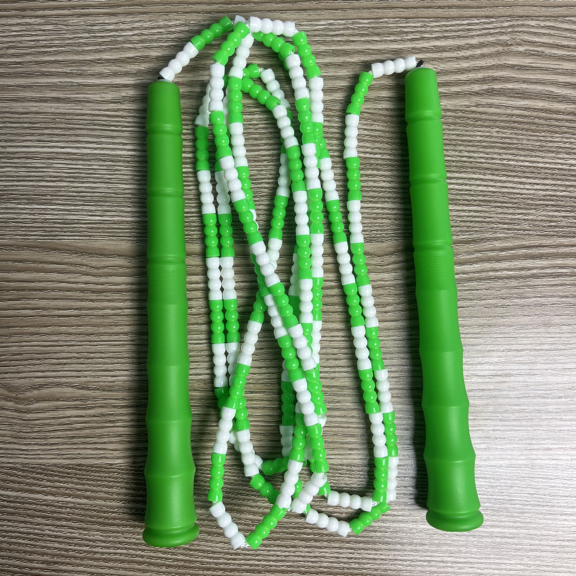 Picture of Manufacturer Wholesale Children's Fitness Sports Pattern Skipping Rope Kindergarten Competition Soft Bead Bamboo Skipping Rope for Primary School Students