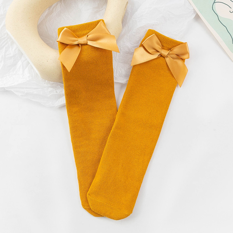 Picture of Children's Mid-Calf Socks, Solid Color Bowknot, Suitable for Both Small and Large Children, Slouch Socks That Can Be Worn Front or Back, Straight Tube, No Heel Socks for Girls