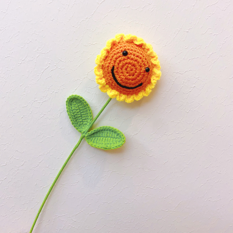 Picture of Smiley face sunflower artificial flower finished hand-woven bouquet sunflower wool knitting wholesale teacher's day gift