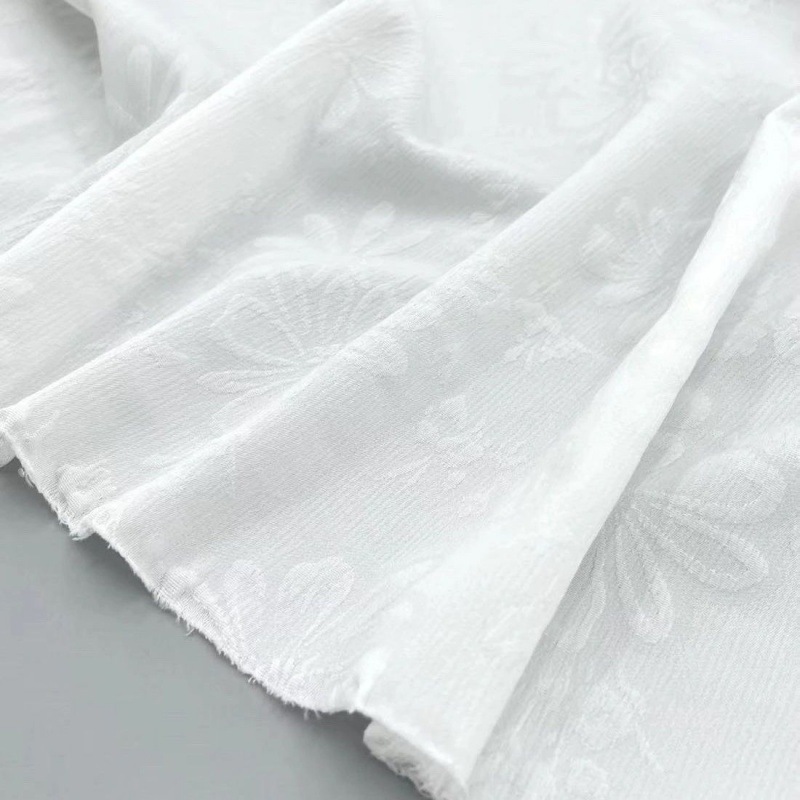 Picture of Floating sunflower four-sided elastic fabric milk white Chinese clothing three-dimensional fabric pleated texture flower jacquard cheongsam manufacturers