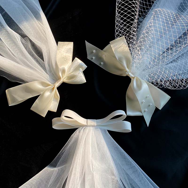 Picture of 2024 New Arrival Bow Veil Super Fairy Wedding Travel Photo White Satin Mesh Hairpin Bridal Hair Accessories